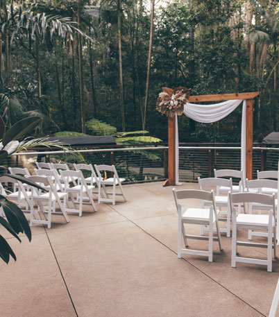 White Chairs and an altar set up at Lost Valley