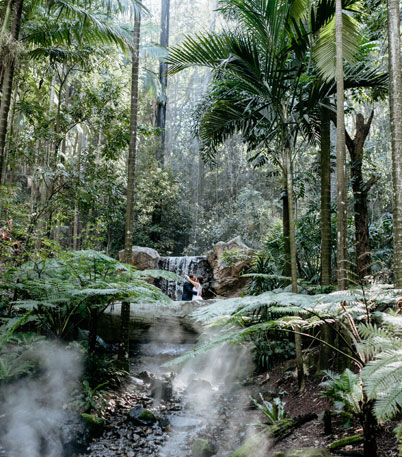 Bride and Groom embracing at the Lost Valley